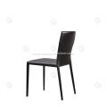 Black saddle leather armless dining chairs